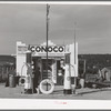 Filling station is only building of modern design in the Spanish-American village of Penasco, New Mexico