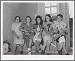 Spanish-American women waiting to see doctor at the traveling clinic at Chamisal, New Mexico