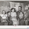 Mr. and Mrs. Jack Whinery and their five children in their dugout. Pie Town, New Mexico. Mr. Whinery had worked on farms in Texas for wages until homesteading one year ago