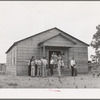 Farm folks in front of church before community sing starts. Pie Town, New Mexico