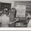 The dancers gather around for refreshments at the square dance. Pie Town, New Mexico