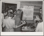 The dancers gather around for refreshments at the square dance. Pie Town, New Mexico