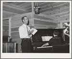 Leading the singers at the community sing. Pie Town, New Mexico