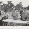 Farm women getting dinner ready at the all-day community sing. Pie Town, New Mexico