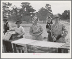 Farm women getting dinner ready at the all-day community sing. Pie Town, New Mexico