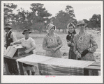 Farm women getting dinner ready at the all-day community sing. Pie Town, New Mexico