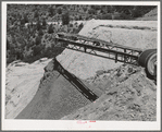 Belt conveyor which drops the tailings onto pile in the valley below. Mill at Mogollon, New Mexico