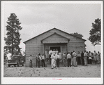 Crowd outside the church during the dinner hour at the community sing. Pie Town, New Mexico