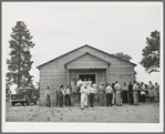 Crowd outside the church during the dinner hour at the community sing. Pie Town, New Mexico