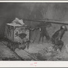 Mucking gold ore at mine. Mogollon, New Mexico