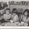 Spanish-American children at the dinner table. Chamisal, New Mexico