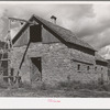 Old brick barn, one of the first constructed in the Animas River Valley. La Plata County, Colorado