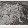 Stream of tailings from large active gold mill in San Juan County, Colorado