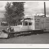 Motor locomotive of railroad equiped with snow plow. Durango, Colorado