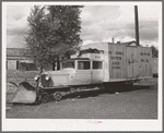 Motor locomotive of railroad equiped with snow plow. Durango, Colorado