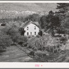 Home of farmer in the Animas River Valley. La Plata County, Colorado