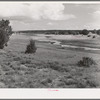 Reservoir of water backed up by dam at Concho, Arizona