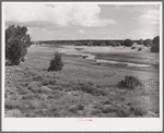 Reservoir of water backed up by dam at Concho, Arizona