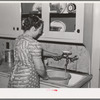 Running water in home of Mormon farmer living in Sana Clara, Utah. As these Mormon farmers live in communities the problem of running culinary water is easily solved