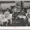 Children looking at picture books at school, Santa Clara, Utah