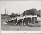 Bridge in Tehama County, California, which was washed out in recent flood of the Sacramento River. Shasta Dam will control a large amount of these flood waters