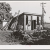 Chicken house and fruit ladders on farm of Paul Erickson. Yuba County, California