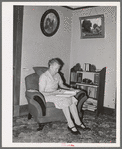 Wife of Elof Hansen in living room of her farm home. He is a small farmer in Yuba County, California