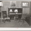 Living room in farm home of John Frost, part owner of 135 acres of semi-marginal land in Tehama County, California. He raises turkeys, hogs and dairy cattle