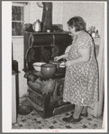 Wife of Jo Webster cooking lunch. Tehama County, California