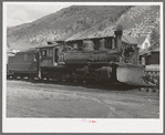 Locomotive of the D. and R.G.W. railroad with snowplow attached. Telluride, Colorado