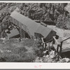 Looking towards the cable house of an aerial tram which carries ore down from mine to mill. Ouray County, Colorado