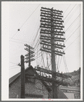 State of desrepair of electrical wiring shows the slowdown in mining operations and consequent desintegration of a town, telluride, Colorado