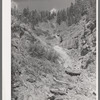 Platform at entrance to tunnel. The gold ore taken from the tunnel requires a built-up platform at the entrance to facilitate handling. Telluride, Colorado