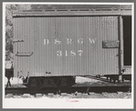 Side of freight car used for transporting gold ore concentrates. Ouray, Colorado