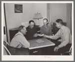 FSA supervisor handing check to chairman of committee for purchase of cooperative ensilage harvester. Cornish, Utah