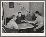 FSA supervisor handing check to chairman of committee for purchase of cooperative ensilage harvester. Cornish, Utah