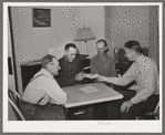 FSA supervisor handing check to chairman of committee for purchase of cooperative ensilage harvester. Cornish, Utah