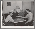 FSA supervisor handing check to chairman of committee for purchase of cooperative ensilage harvester. Cornish, Utah