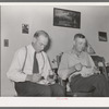 Mormon farmers having refreshments of watermelon and fruit punch after cooperative FSA meeting. Box Elder County, Utah