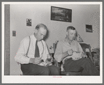 Mormon farmers having refreshments of watermelon and fruit punch after cooperative FSA meeting. Box Elder County, Utah