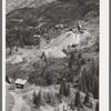 Abandoned gold mines and mills with piles of tailings in San Juan County, Colorado. The results of excessive cutting of timber can be plainly seen