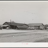 Truck and tractor repair storage shops are centrally located at the Earl Fruit Company ranch. Kern County, California