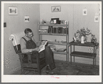 Corner of the living room in home of Mr. Schmidt, member of the Mineral King cooperative farm. Tulare County, California