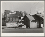 Sign and real estate office at Central Valley, California, boom town near Shasta Dam