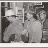 Construction workers being paid off. Shasta Dam, Shasta County, California