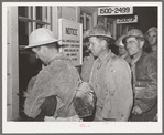 Construction workers being paid off. Shasta Dam, Shasta County, California