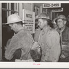 Construction workers being paid off. Shasta Dam, Shasta County, California