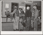Construction workers being paid off. Shasta Dam, Shasta County, California