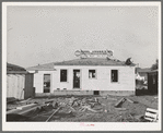 Roofing a house under construction at Pacific Beach, California, which is about six miles from San Diego