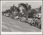 Workmen during lunch period, across the street from the Consolidated Airplane Factory. San Diego, California